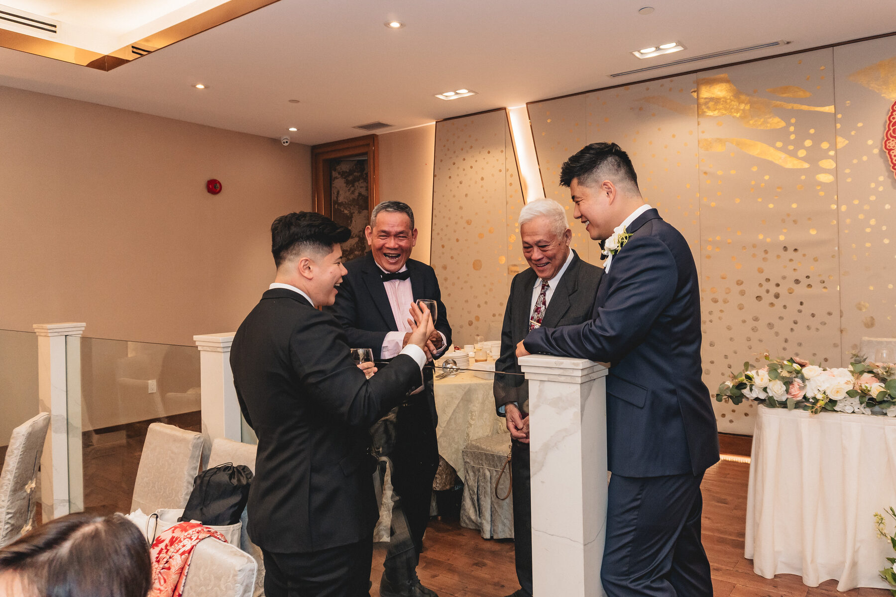 A group toast with the wedding party at Peter & Christine's reception.