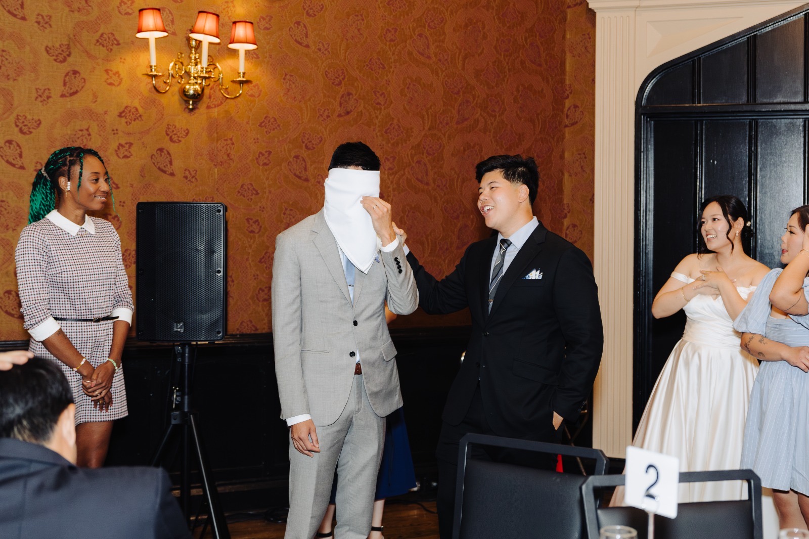 Steven and Esther greeting family during their Toronto reception.