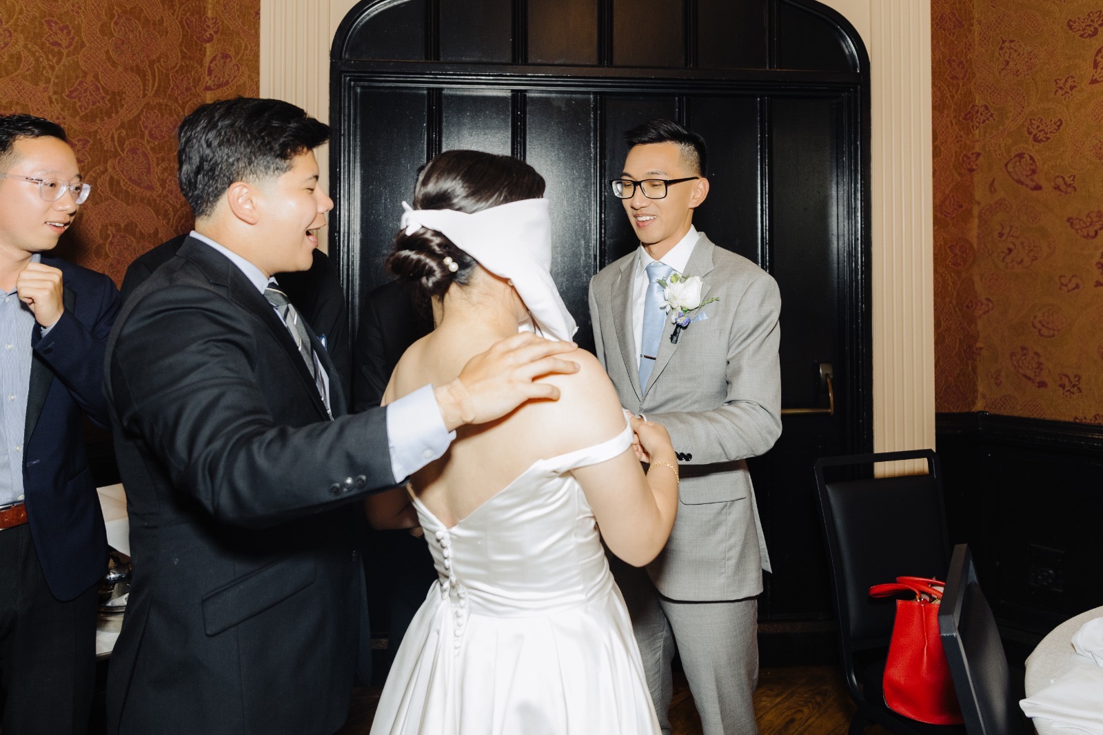 Guests laughing together during Steven & Esther's reception.